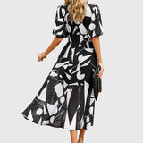 Merlin™ | Lichotivé květinové midi šaty